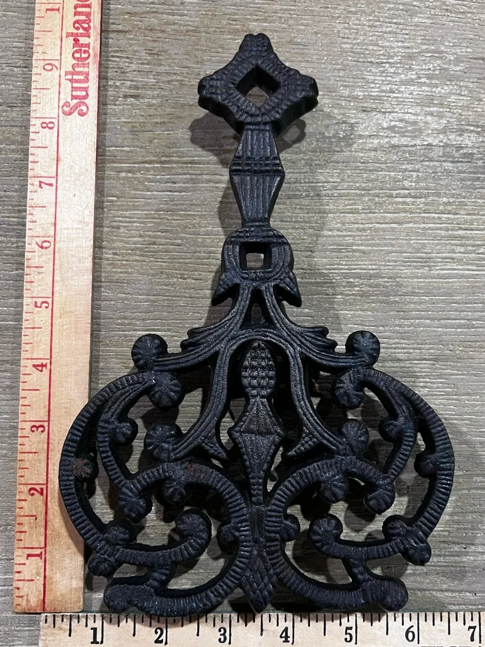Vintage J.Z.H. Cast Iron Trivet #540 — Ornate Floral Scroll Design